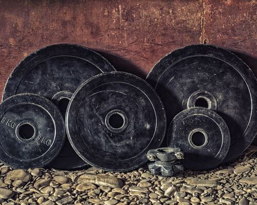 black-bumper-plates-dirty-equipment